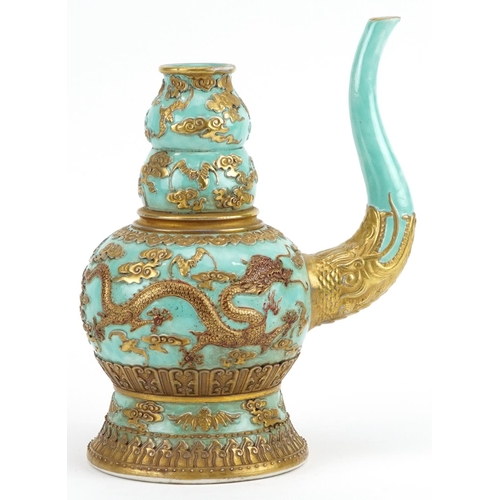 92 - Chinese porcelain turquoise ground wine vessel gilded with dragons and bats amongst clouds, six figu... 