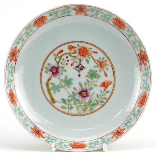 60 - Chinese porcelain shallow dish hand painted in the famille rose palette with flowers, six figure iro... 