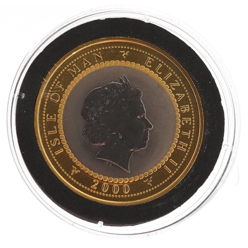 1428 - 2002 world's first 22ct gold and titanium coin struck by The Isle of Man