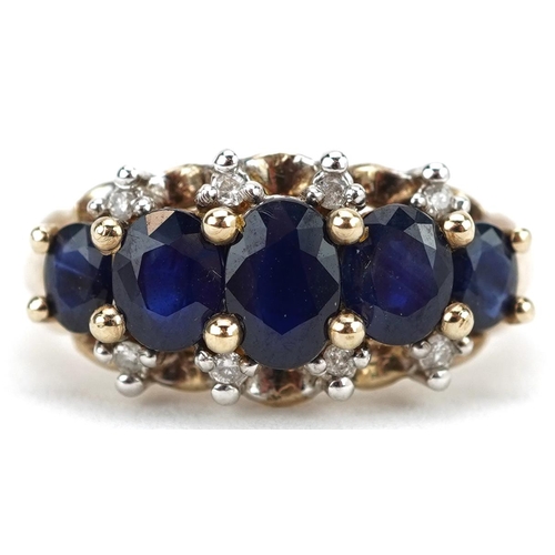 2193 - 9ct gold graduated sapphire and diamond ring, size K/L, 3.1g