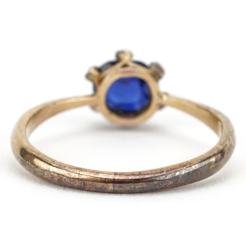 2736 - 18ct gold sapphire and diamond cluster ring, the sapphire approximately 6.60mm x 5.80mm x 3.50mm dee... 