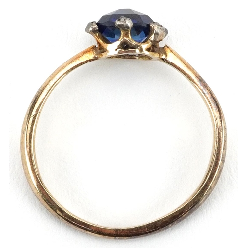 2736 - 18ct gold sapphire and diamond cluster ring, the sapphire approximately 6.60mm x 5.80mm x 3.50mm dee... 