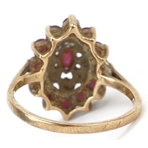 2101 - 9ct gold ruby and diamond three tier cluster ring, size K, 2.2g