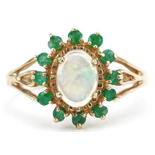 2182 - 9ct gold cabochon opal and emerald cluster ring with pierced shoulders, size L, 2.0g