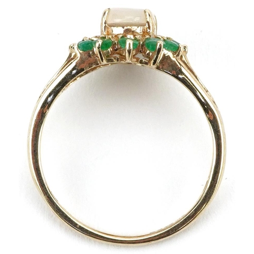 2182 - 9ct gold cabochon opal and emerald cluster ring with pierced shoulders, size L, 2.0g