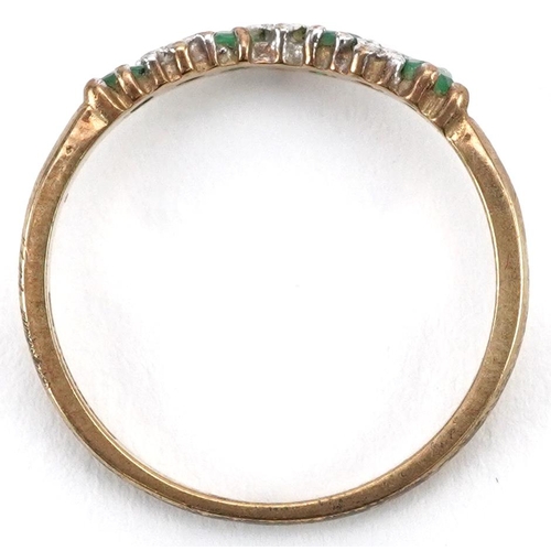 2717 - 9ct gold diamond and emerald wishbone ring, size K/L, 1.1g