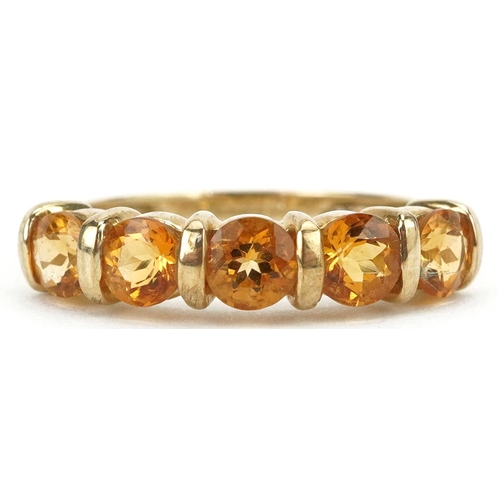 2166 - 9ct gold citrine five stone ring, size J, 1.8g