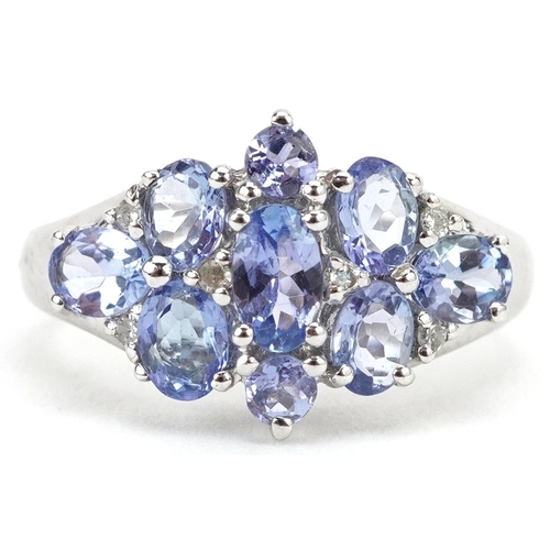 2097 - 9ct white gold tanzanite and diamond cluster ring, size J, 2.7g