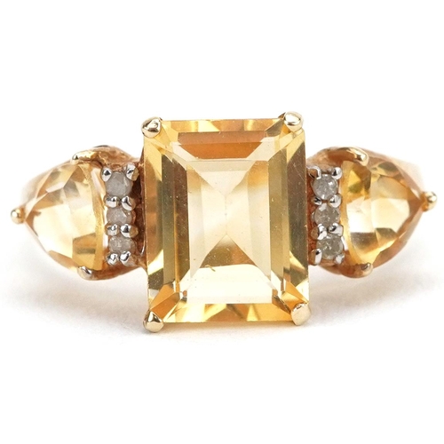 2086 - 10ct gold citrine and diamond ring, size O, 1.6g