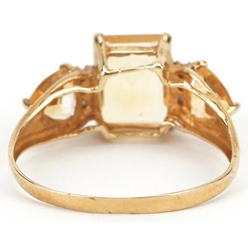 2086 - 10ct gold citrine and diamond ring, size O, 1.6g