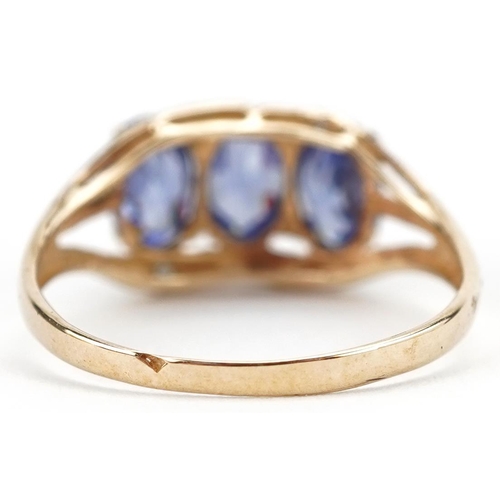 2757 - 9ct gold tanzanite and diamond ring with split shoulders, size M, 1.4g