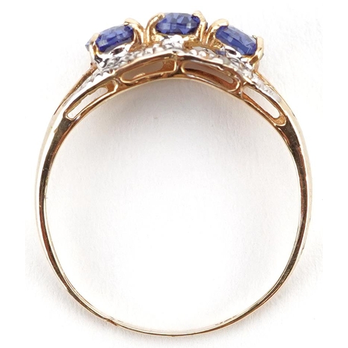 2757 - 9ct gold tanzanite and diamond ring with split shoulders, size M, 1.4g