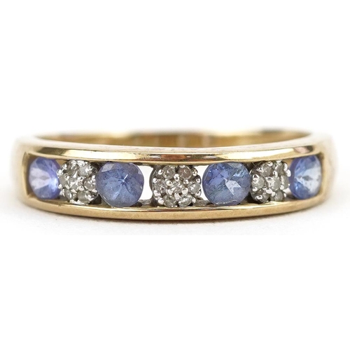 2121 - 9ct gold tanzanite and diamond half eternity ring, size Q, 2.2g