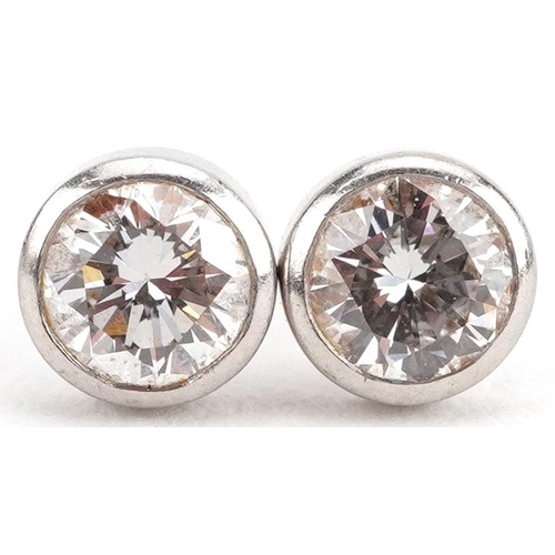 2609 - Pair of unmarked platinum diamond solitaire stud earrings, each diamond approximately 4.40mm in diam... 