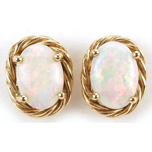 2607 - Pair of 9ct gold cabochon opal stud earrings, 9mm high, 1.2g