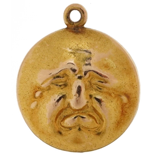 2198 - Unmarked gold happy and sad face charm, 15mm in diameter, 1.7g