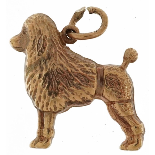 2129 - 9ct gold poodle charm, 1.8cm high, 0.7g