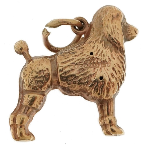 2129 - 9ct gold poodle charm, 1.8cm high, 0.7g