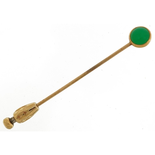 2756 - Tiffany & Co, unmarked gold green stone stickpin with box, tests as 14ct gold, housed in an S Kind &... 