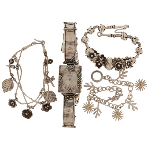 2780 - Silver jewellery comprising three bracelets and an Art Nouveau style ladies wristwatch, 93.0g