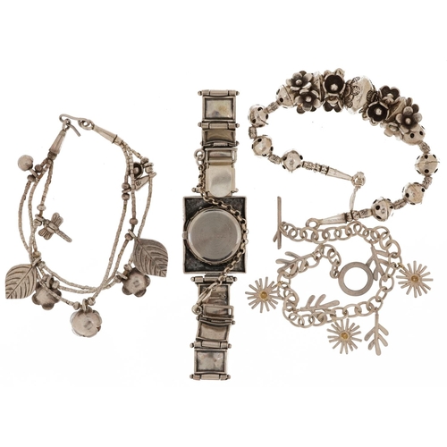 2780 - Silver jewellery comprising three bracelets and an Art Nouveau style ladies wristwatch, 93.0g