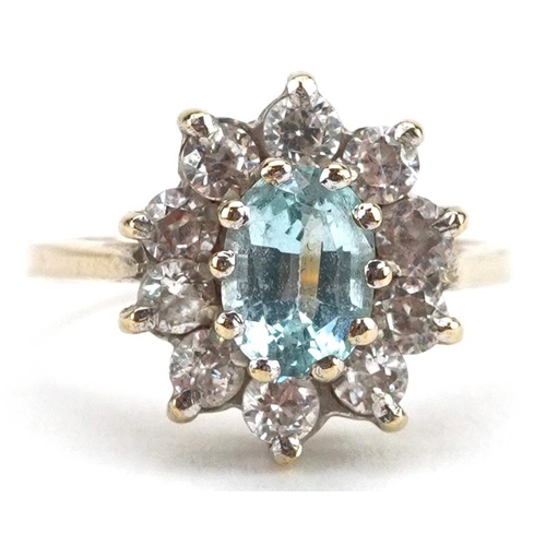 2138 - 9ct gold blue topaz and clear stone cluster ring, size M, 3.1g