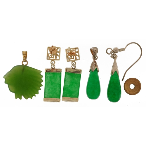 2734 - Jade jewellery including a pair of Chinese earrings with white metal mounts, total weight 11.5g