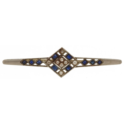 2692 - Art Deco unmarked white gold diamond and sapphire bar brooch, tests as 9ct gold, the larger diamonds... 