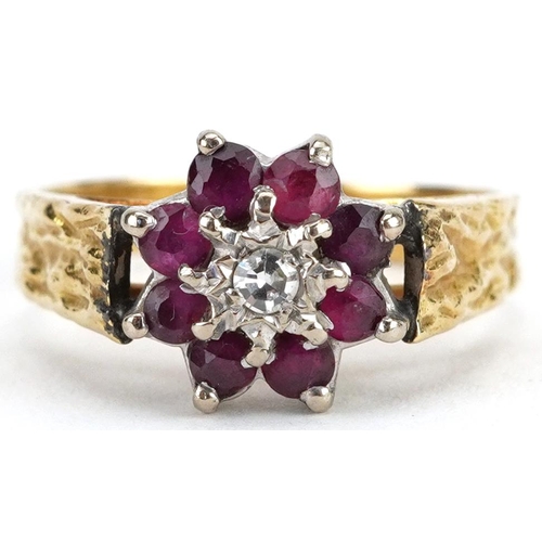 2213 - 18ct gold diamond and pink stone flower head ring with engraved shoulders, size L, 4.0g