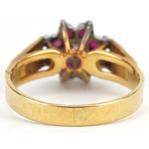 2213 - 18ct gold diamond and pink stone flower head ring with engraved shoulders, size L, 4.0g