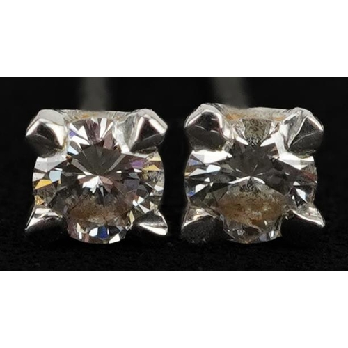 2623 - Pair of silver diamond solitaire stud earrings, approximately 2.49mm in diameter, 0.8g