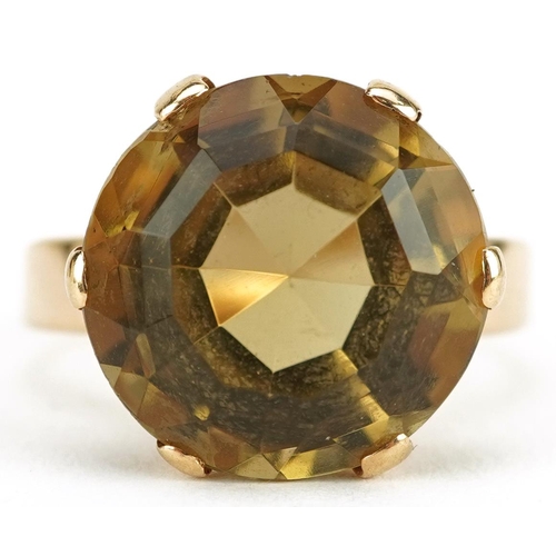 2671 - Unmarked gold citrine solitaire ring, the citrine approximately 13.80mm in diameter x 8.80mm deep, s... 