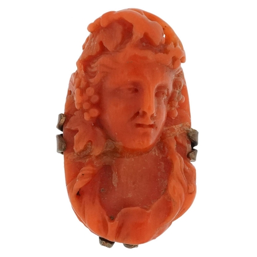 2712 - Antique pink coral cameo brooch carved with a maiden head, 3cm high, 8.5g