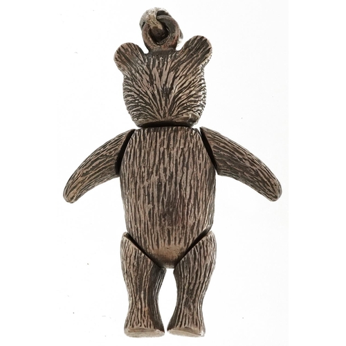 2718 - Silver teddy bear pendant with articulated limbs, 4.5cm high, 13.8g