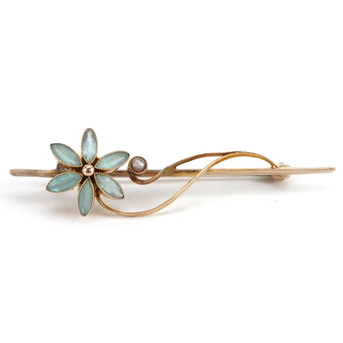 2196 - Unmarked gold blue stone and seed pearl floral bar brooch, 4.5cm wide, 2.4g