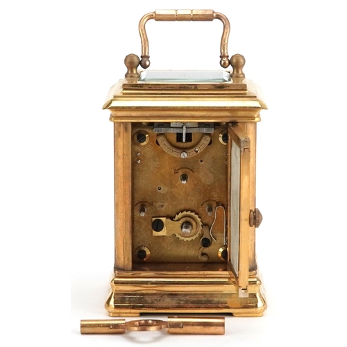 250 - Miniature brass cased carriage clock with swing handle and Sevres style panels hand painted with Put... 