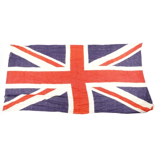 438 - Two naval interest ensign flags, the largest 205cm x 112cm