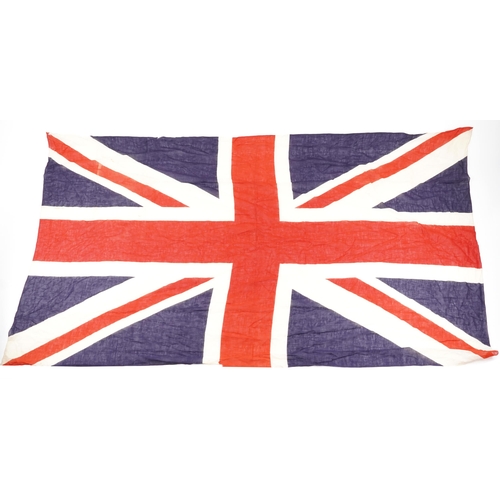 438 - Two naval interest ensign flags, the largest 205cm x 112cm