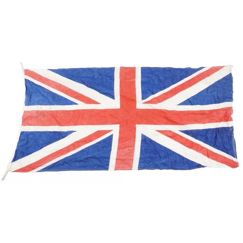 438 - Two naval interest ensign flags, the largest 205cm x 112cm