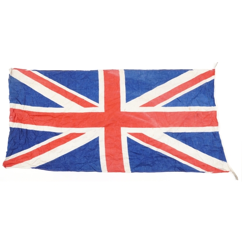 438 - Two naval interest ensign flags, the largest 205cm x 112cm