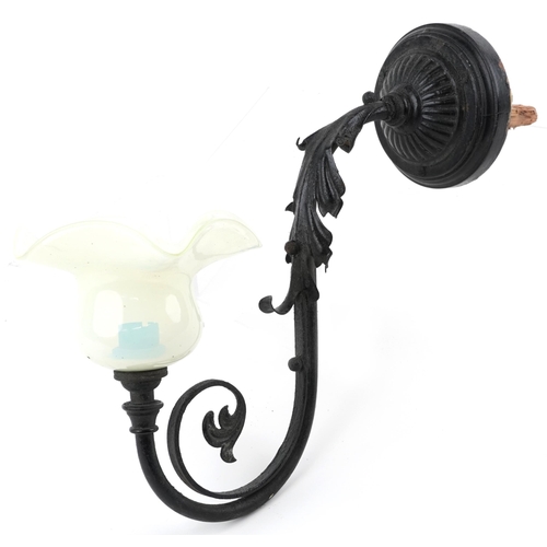 206 - Art Nouveau painted iron wall light with frilled Vaseline glass shade, 35cm in length