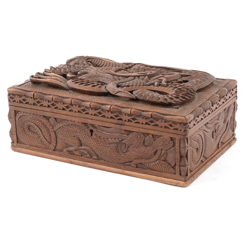 1216 - Chinese hardwood jewellery chest having lift out interior and hinged lid deeply carved a dragon, 12c... 