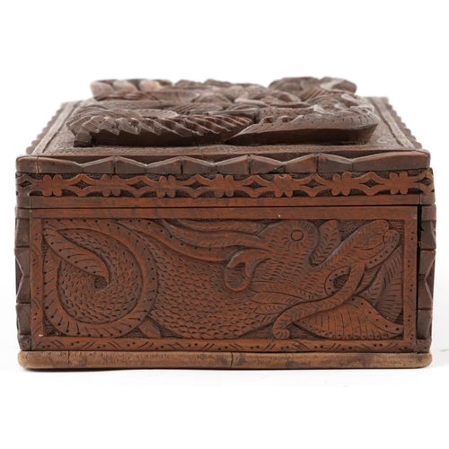 1216 - Chinese hardwood jewellery chest having lift out interior and hinged lid deeply carved a dragon, 12c... 