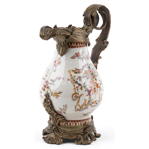 313 - Rococo style porcelain pitcher with bronze mounts decorated with Putti and flowers, 38.5cm high