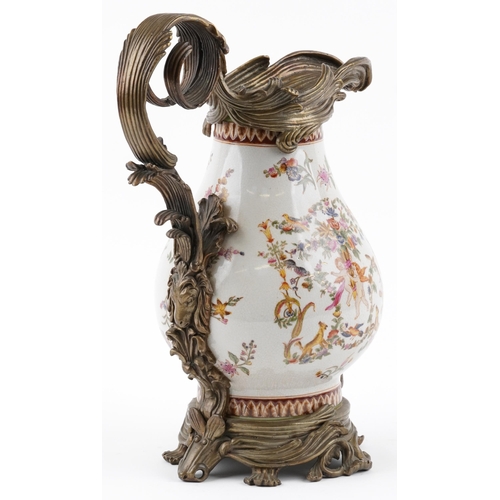 313 - Rococo style porcelain pitcher with bronze mounts decorated with Putti and flowers, 38.5cm high