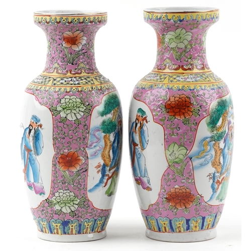 1122 - Pair of Chinese porcelain vases decorated with figures and flowers, each 37cm high