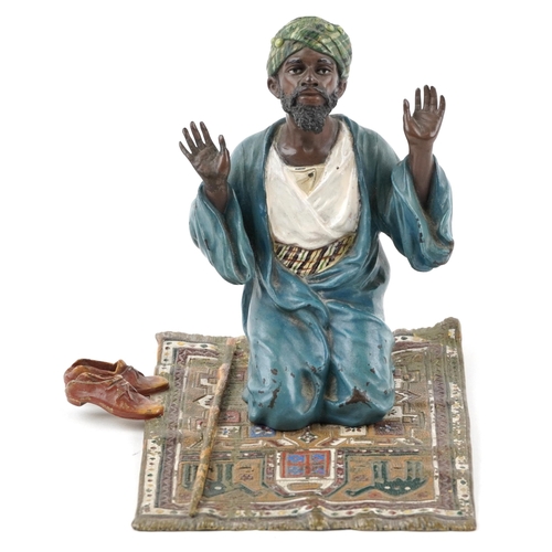 7 - Manner of Franz Xaver Bergmann, cold painted bronze of an Arab praying, 15cm in length