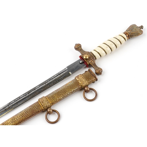 469 - German military interest naval officer's dagger with scabbard and engraved steel blade, 42cm in leng... 