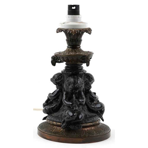 251 - 19th century classical table lamp with Putti musicians and ram's heads having bronze mounts, 30cm hi... 