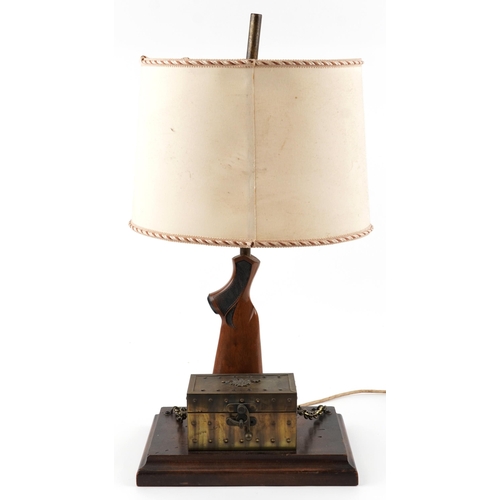 280 - Steampunk hardwood table lamp with shade, rifle butt and bronzed casket, 74.5cm high